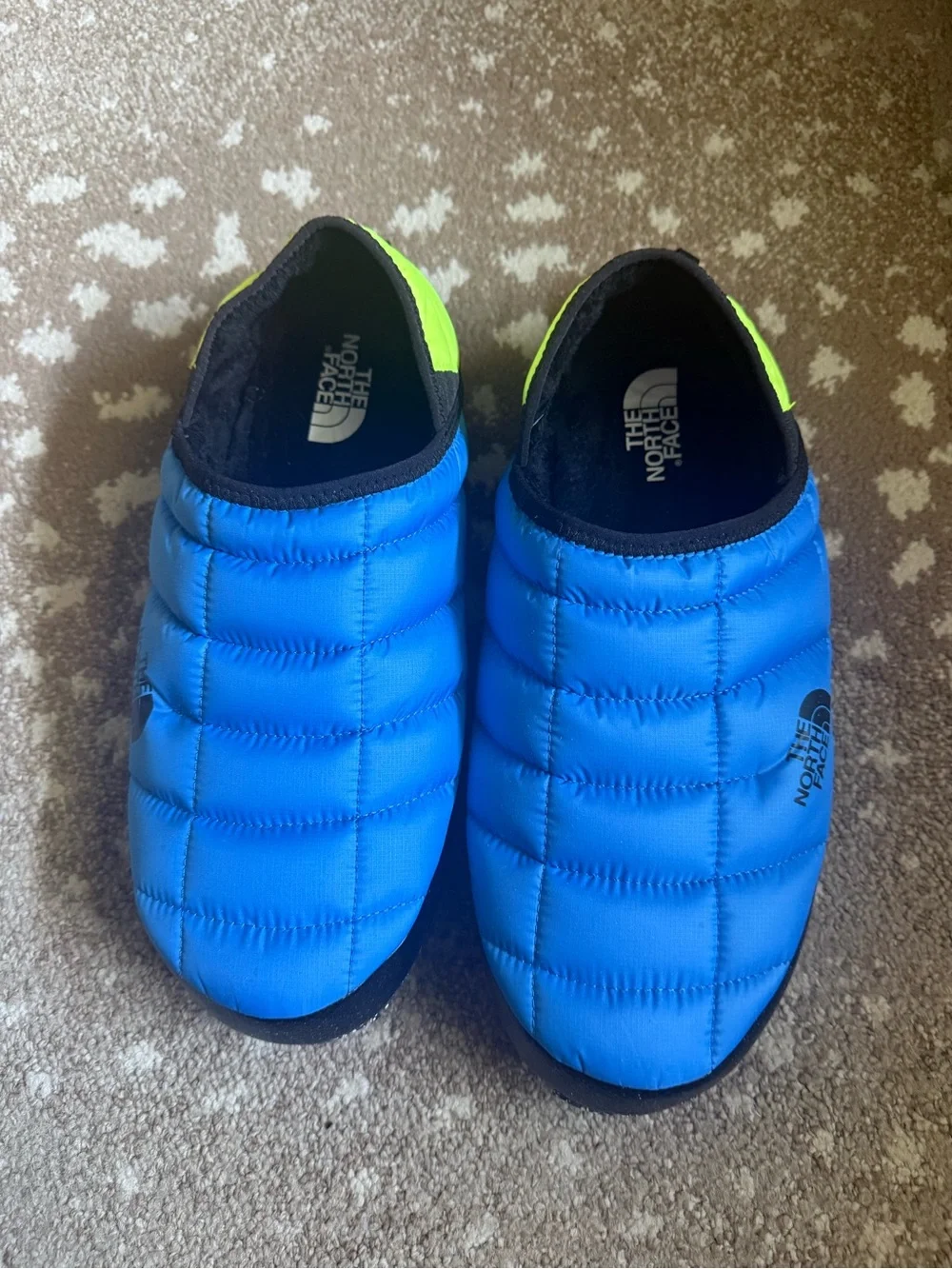 The North Face Men’s Blue and Neon yellow and black Slip-On Slippers